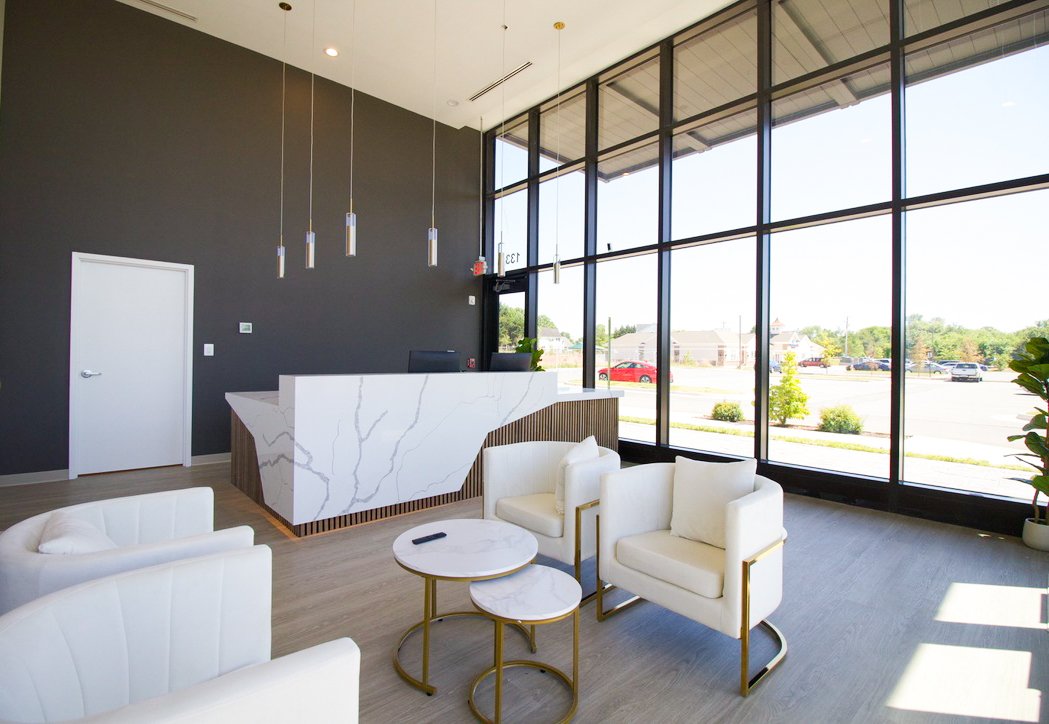 Manassas Dental & Cosmetics lobby interior with floor-to-ceiling windows